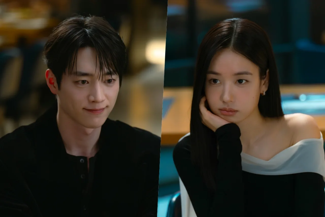 Seo Kang Jun e Ahn Eun Jin aparecem em trajes de gala, sentados à mesa de um restaurante luxuoso, ao lado de velas