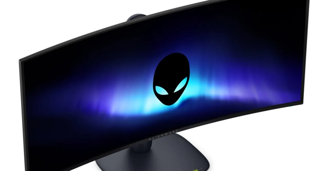 Monitor gamer QD-OLED em mesa organizada com teclado mecânico, mouse ergonômico e iluminação RGB em ambiente moderno
