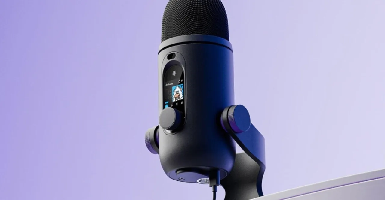 Microfone Blue Yeti 2 da Logitech G com LED colorido, sensor de proximidade e logo da marca ao fundo