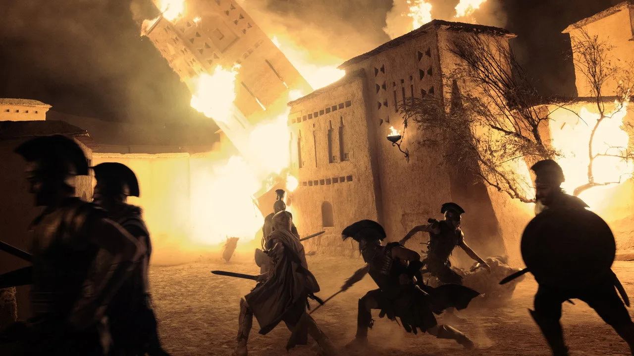 Atleta correndo na esteira enquanto assiste a trailer de “The Odyssey” em um tablet