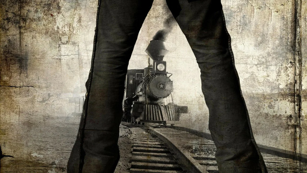 Homem musculoso faz agachamento segurando um chapéu de cowboy ao fundo da tela de cinema