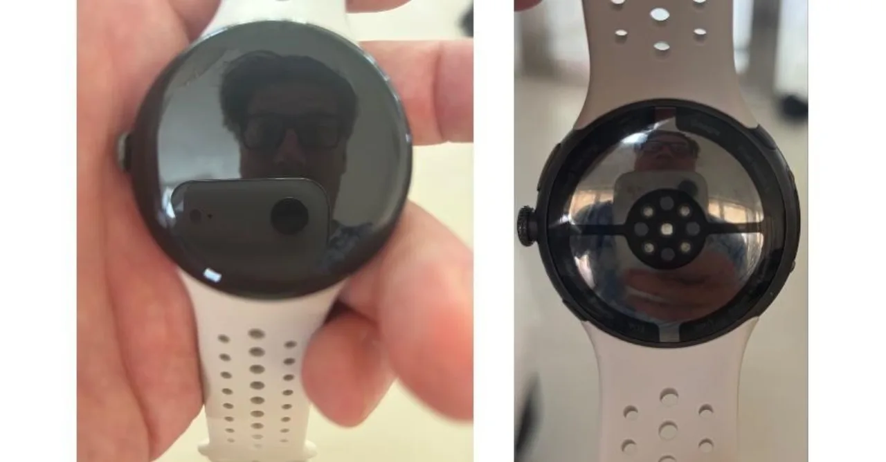 Close no pulso com Pixel Watch 5 durante treino de musculação, exibindo métricas cardíacas e halteres ao fundo