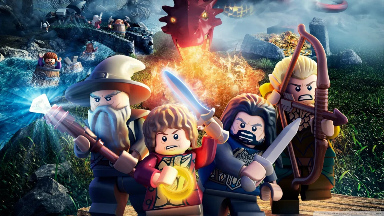 Minifigura de LEGO levantando halteres ao lado do console PlayStation em miniatura com controle plugado