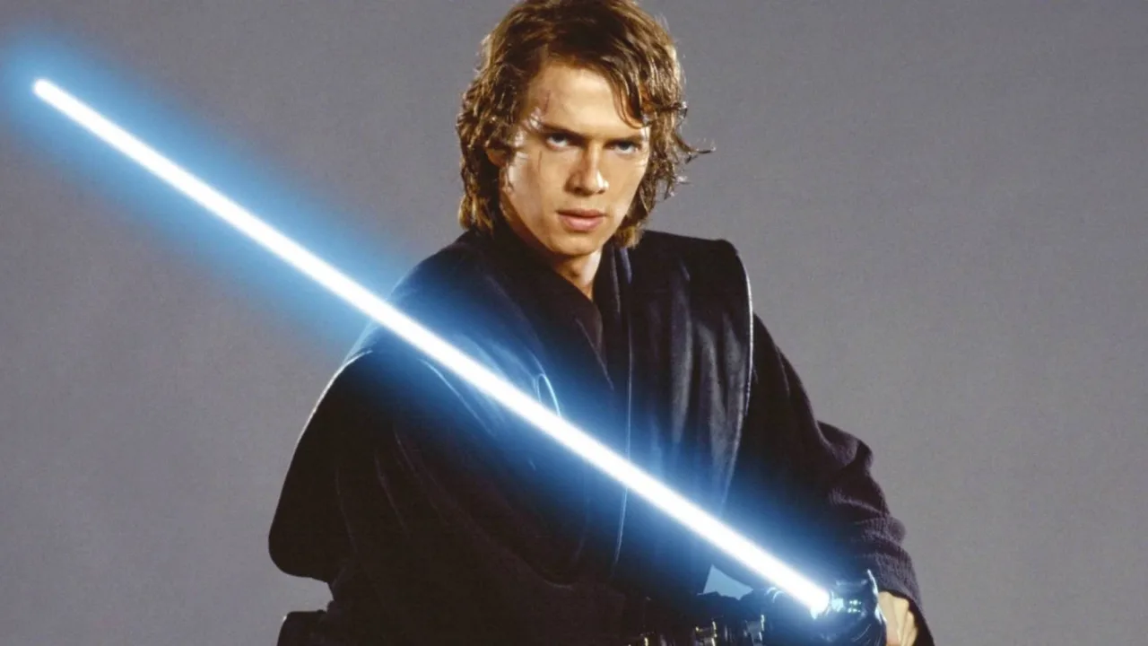 Quatro sabres de luz — Obi‑Wan, Anakin, Darth Vader e Yoda — alinhados sobre fundo escuro com logo da Heritage Auctions
