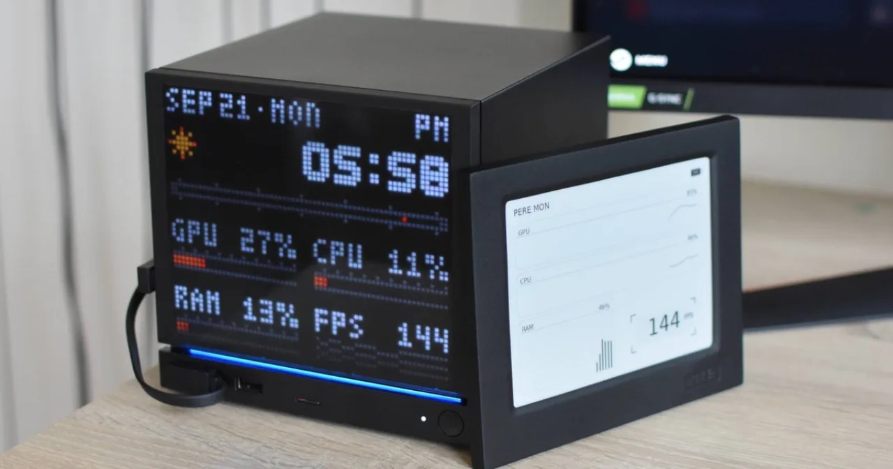 Steam Machine da JSAUX com faceplates E‑Ink exibindo dados e PixelMatrix iluminado ao lado, ambos com logo da marca