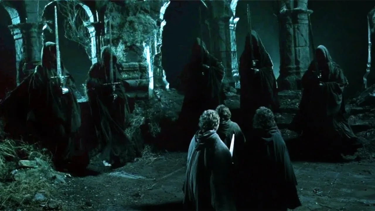 Homem fazendo agachamento com barra em forma de anel, ao fundo pôr‑do‑sol de montanhas de Mordor