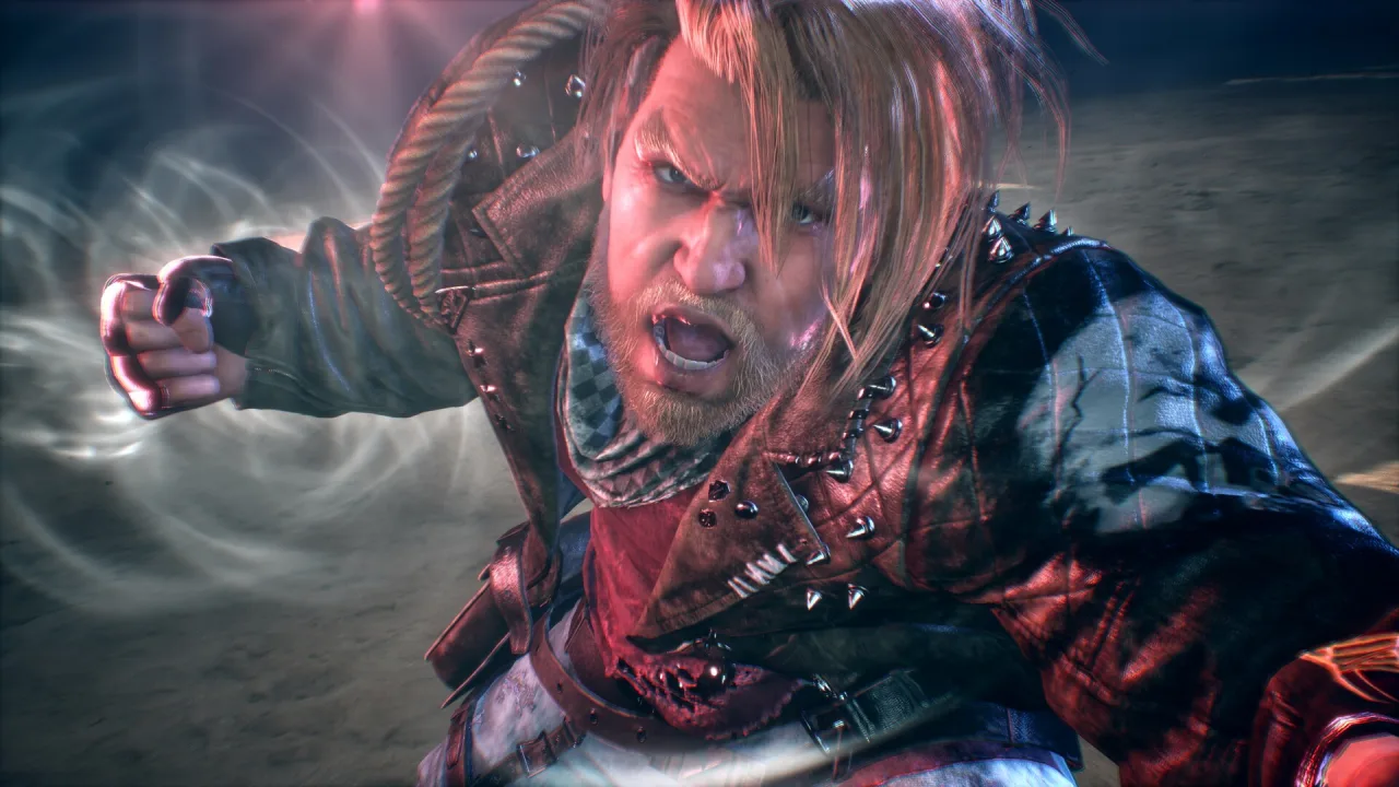Yujiro Hanma exibindo músculos definidos e postura de combate intensa em um cenário de arena de luta de Tekken 8