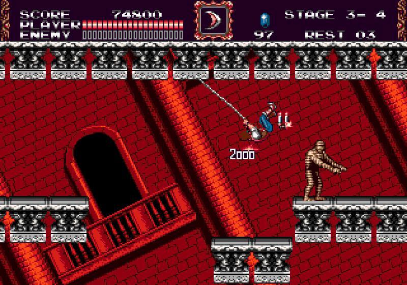 Jovem jogando Castlevania no console enquanto faz agachamento com halteres ao lado