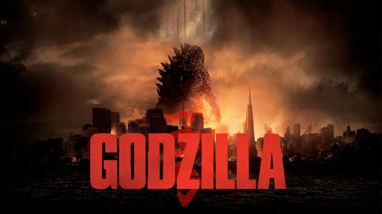 Atleta levanta barra com pesos em forma de Godzilla e Kong, ao fundo pôster dos monstros desaparecidos