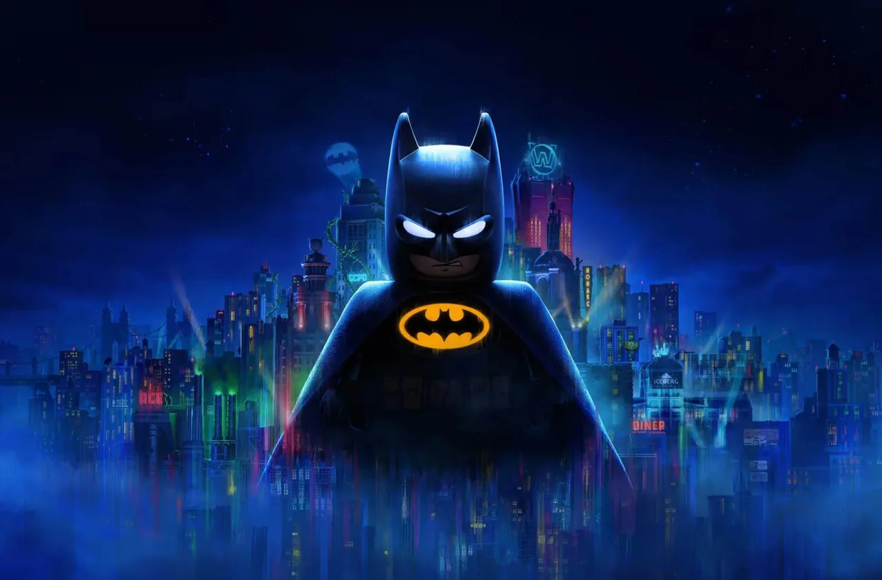 Boneco LEGO Batman ao lado de um controle de Xbox e uma maçã verde sobre uma mesa de madeira clara