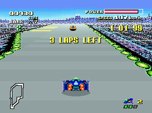 Atleta em bicicleta ergométrica, vestindo camiseta com logo retro de F‑Zero, ao lado de um controle de Nintendo