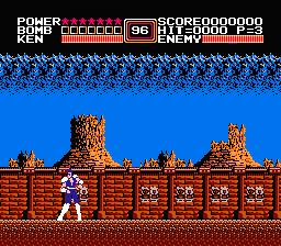 Kenshiro em pose de luta, vestindo faixa vermelha, segurando halteres e fazendo flexão