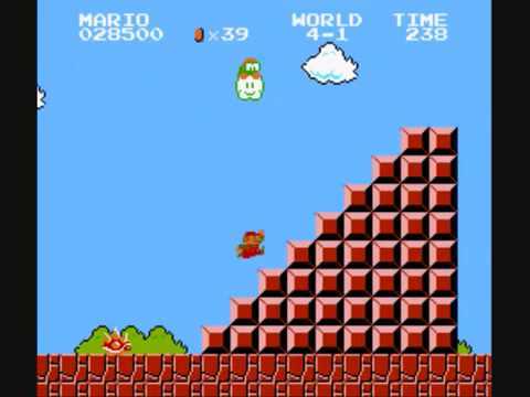 Jovem vestindo camiseta da Nintendo faz agachamento segurando o conjunto de pins comemorativo do Mario 40 anos